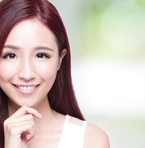 a young woman smiling brightly