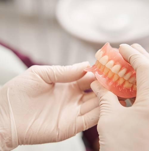 full dentures can replace an entire arch of missing teeth