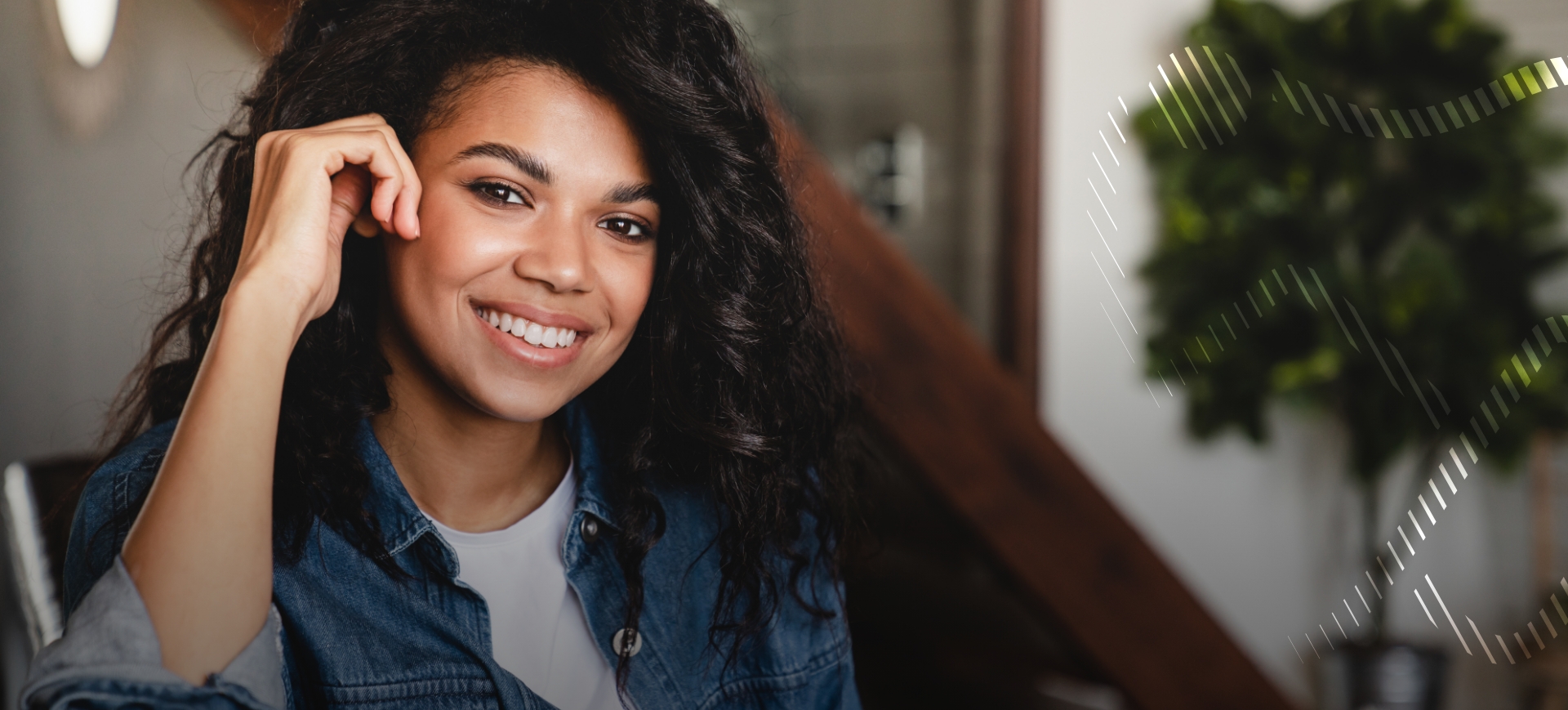 Young woman in denim jacket smiling