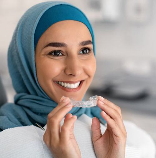  Patient in Colorado Springs smiling with Invisalign